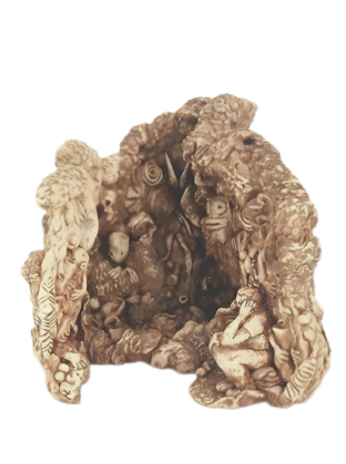 Decorative piece resembling a natural rock formation with organic textures on a white background