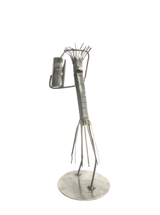 Metal sculpture of a person carrying a water bucket on a white background
