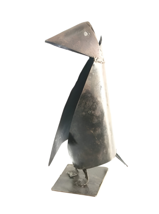 Metallic sculpture of a penguin bird on a white background