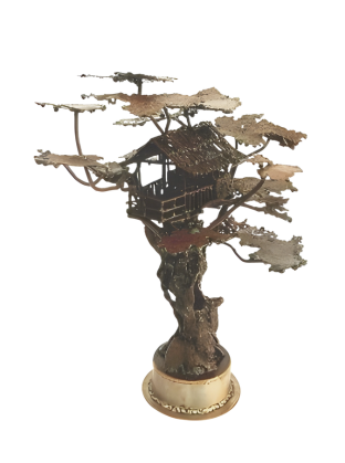 Bronze sculpture of a treehouse  on a white background